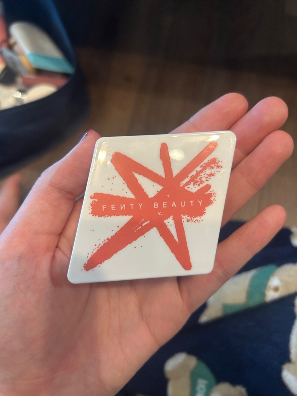 Fenty Beauty White Compact with Coral Star Logo